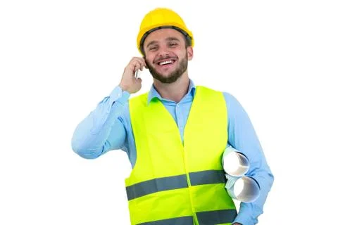 Angry upset young construction engineer yeling at the phone Stock Photos