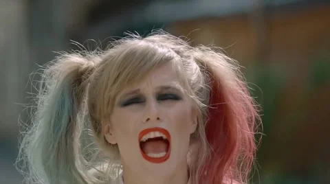 Angry woman screaming, beautiful female face with fashion makeup. Stock Footage