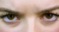 Angry woman screwing up her eyes, extreme close-up. Anxious, nervous person HD Footage