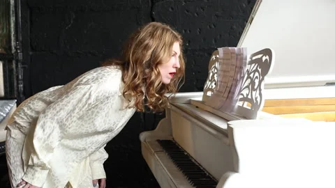 Angry woman in white  look at the notes Video stock 170576853