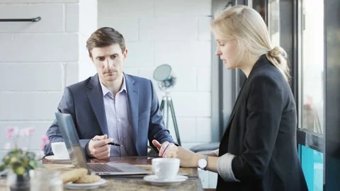 Angry Young Business People Disputing Vigorously Stock Footage 71037580