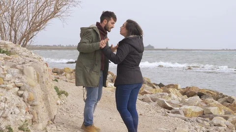 Angry young lovers arguing on the beach.Break up,crisis Stock Footage 104680100