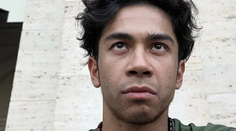 Angry young man with aggressive look: close up front portrait Stock Footage 66603027