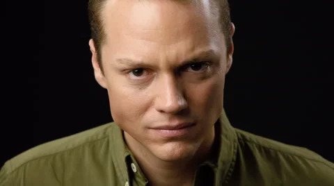 Angry young man close up Видео 42252449