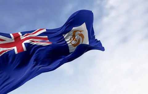 Anguilla Flag waving in the wind on a clear day Stock Illustration