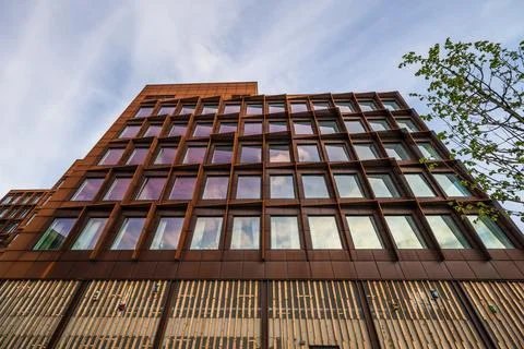 Angular architecture of modern glass building. Stock Photos