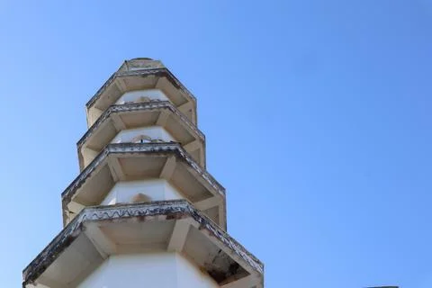 Angular Ascendancy Architectural Tower Reaching Towards the Azure Sky Stock Photos
