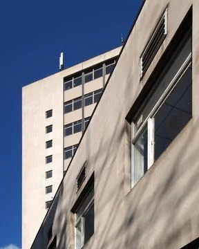 angular close up view of an old 1960s concrete brutalist stye building wi... Stock Photos