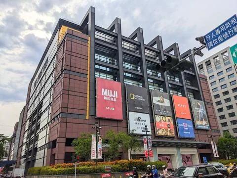 Angular facade of the Shin Kong Mitsukoshi shopping mall in Tainan under an Stock Photos