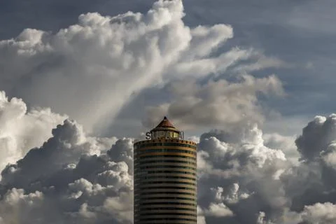 Angular geometric mirror cladding on a modern building. Stock Photos