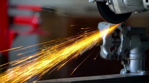 Angular grinding machine is cutting the metal Stock Footage 75766819