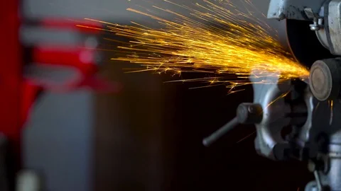 Angular grinding machine is cutting the metal Stock Footage 75936621