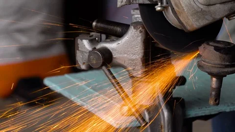 Angular grinding machine is cutting the metal Stock Footage 76986935
