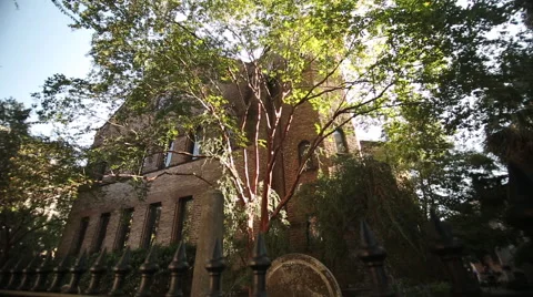 Angular pan across front exteriror of Circular Church-Charleston Stock Footage 60925432