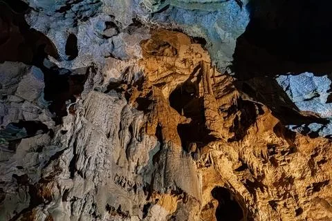 Angular rock structure and disturbed sedimentary layers inside a limestone .. Stock Photos