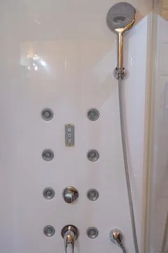 Angular shower enclosure with transparent doors. 写真素材