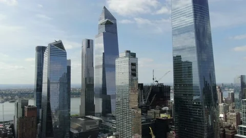 Angular west side skyscraper overlooks the Hudson River waterfront Stock-Footage 130995510
