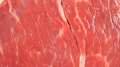 Angus beef rotating. Flat meat surface. Uncooked fresh beef Stock Footage 121169952