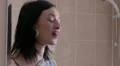 Angy woman looking in mirror applying foundation HD Footage