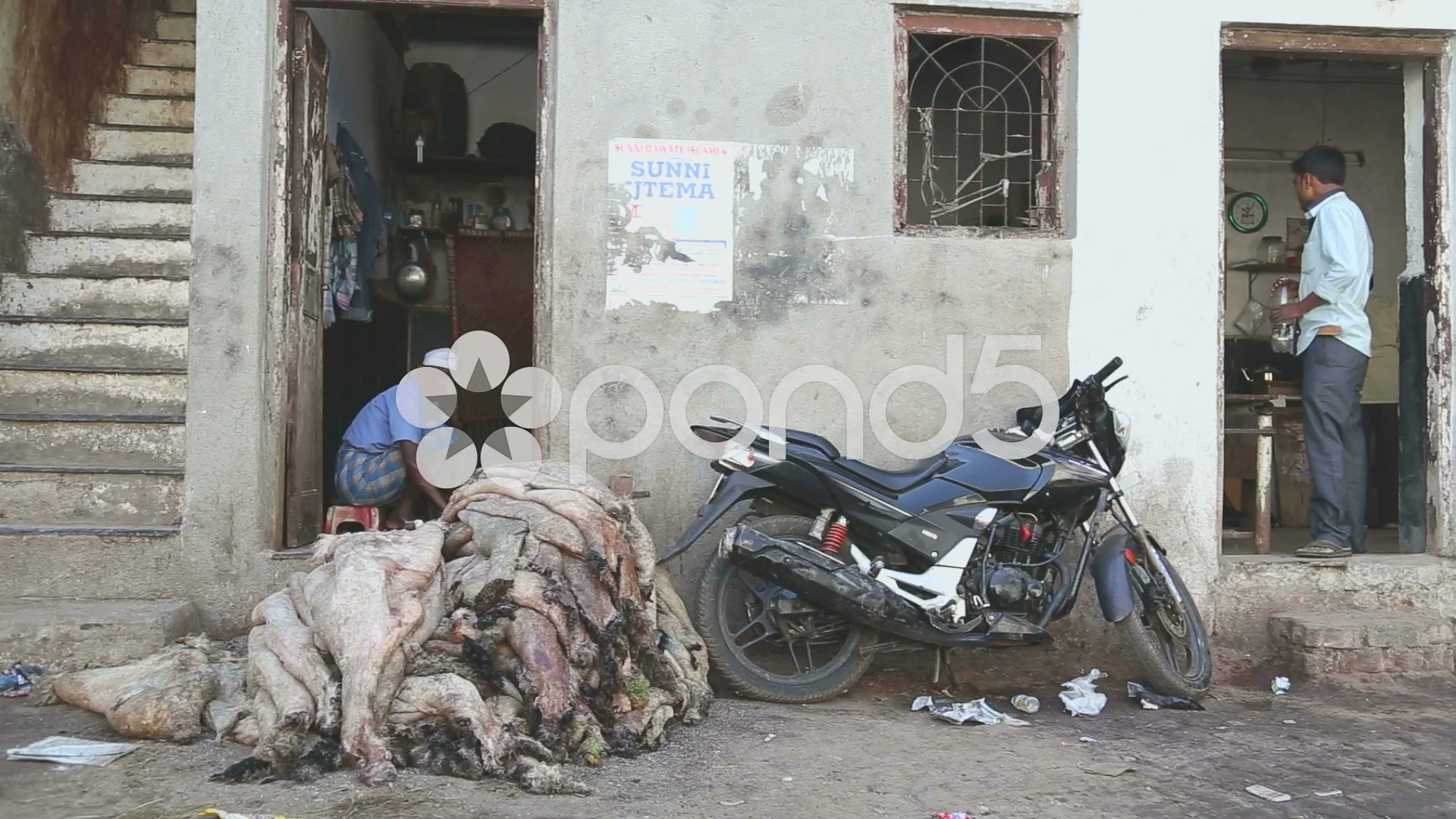 Animal skin on pile and motorcycle in fr... | Stock Video | Pond5