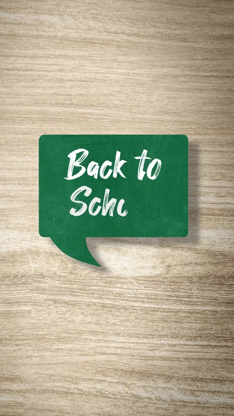 Animated Back to School Chalkboard Speech Bubble on a Wood Texture Background Stock Footage 337736675