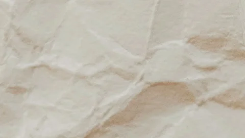 An animated background featuring textured overlay of crumpled paper Stock Footage 331994543