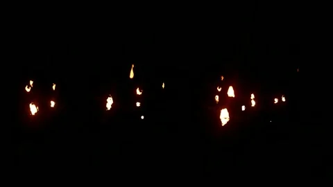 Animated background of fireballs glowing in the dark Stock Footage 285470078