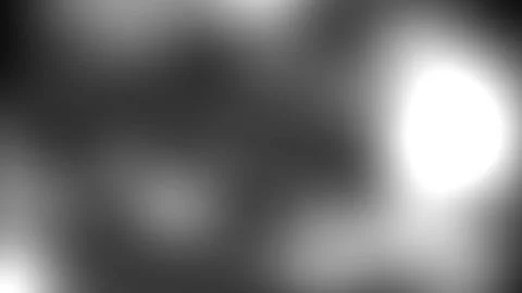 Animated background with soft, blurred bokeh lights in black and white. 動画素材 315778202