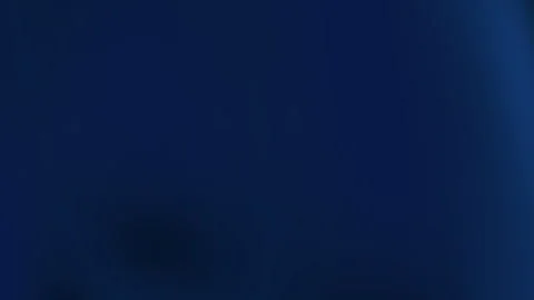 Animated blue and black gradient background with light variations Stock Footage 324773135