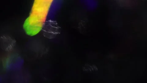 Animated bokeh transition with light leaks and bright rays in the background vid Stockbeeldmateriaal 317538035