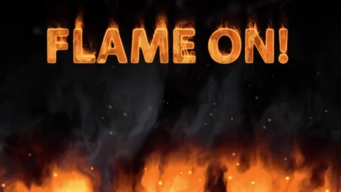 Animated Burning Text with Ground Fire and Rising Smoke on Black Background Stock Footage 340758449