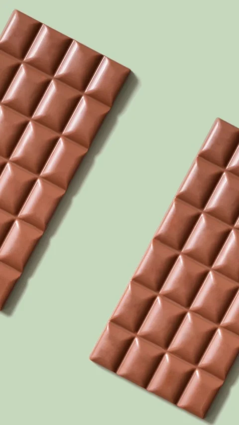 Animated chocolate bar pattern. World Chocolate Day concept Stock Footage 241114888