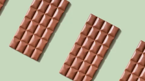 Animated chocolate bar pattern. World Chocolate Day concept Stock Footage 241114893