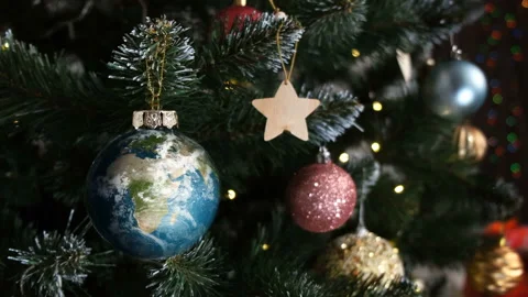 Animated Christmas Toy on a Tree in Shape of Planet, Close Up Shot. Stock Footage 145210643