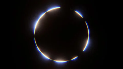 Animated chromatic rgb loop circle with a glowing solar eclipse effect. Stock Footage 347995320
