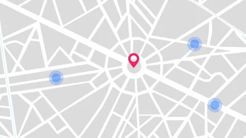 Animated city map with pulsing red pinpoint in the center roundabout, while Stock Footage 315674744