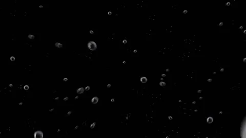 An animated colorful bubble background with a smooth black background Stock Footage 132356189