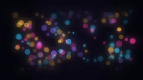 Animated falling Colorful bokeh lights on black background. Vídeos de archivo 335999993