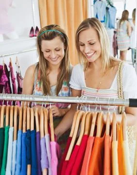 Animated female friends doing shopping Stock Photos