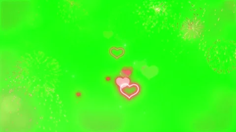 Animated fireworks display with floating glowing hearts over bright green Stockbeeldmateriaal 344240259