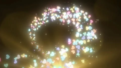 Animated glowing multi colored heart particles swirling in golden light rays Vidéo 345332563
