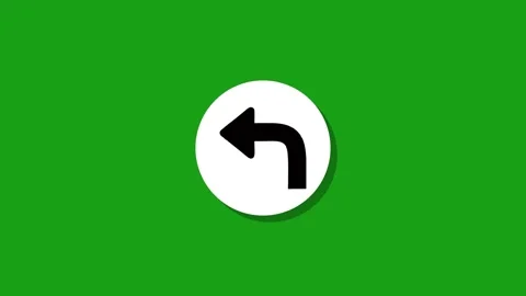 Animated graphic of a white circle with black arrow turning left on green s.. Stock Footage 329272606