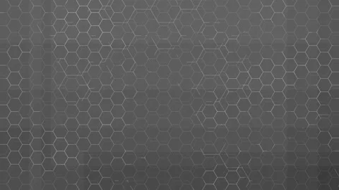Animated hexagonal grid pattern background in dark gray monochrome with subtle Stock Footage 310360277
