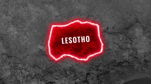 Animated map highlighting lesotho with glowing outline and flag Stock Footage 343675596
