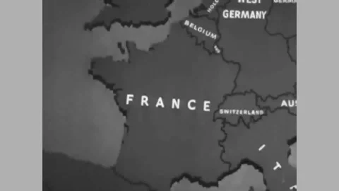Animated maps show the spread of Communism and troops march and Supreme Stock Footage 100554679
