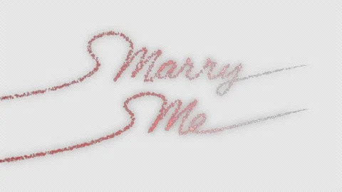 Animated Marry Me text with glowing particles on alpha background. Stock Footage 264104184