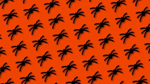 Animated Pattern of Black Plastic Spiders Moving on Bright Orange Backgroun.. Stock Footage 345043135