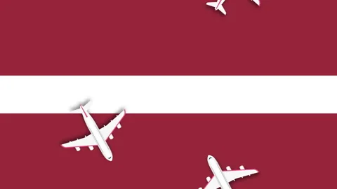 Animated plane flying over the the flag of Latvia. Stock Footage 244732584