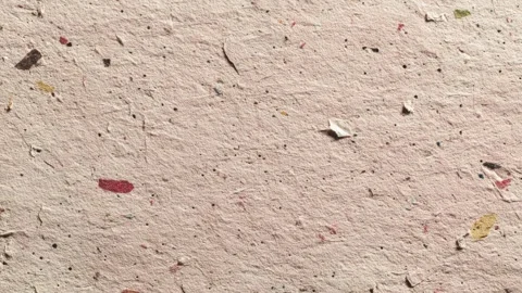 Animated Recycled Paper Texture Background With Visible Colored Flecks Video stock 327901661