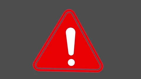 Animated red alert icon on dark screen background in 4k Stock Footage 323315611